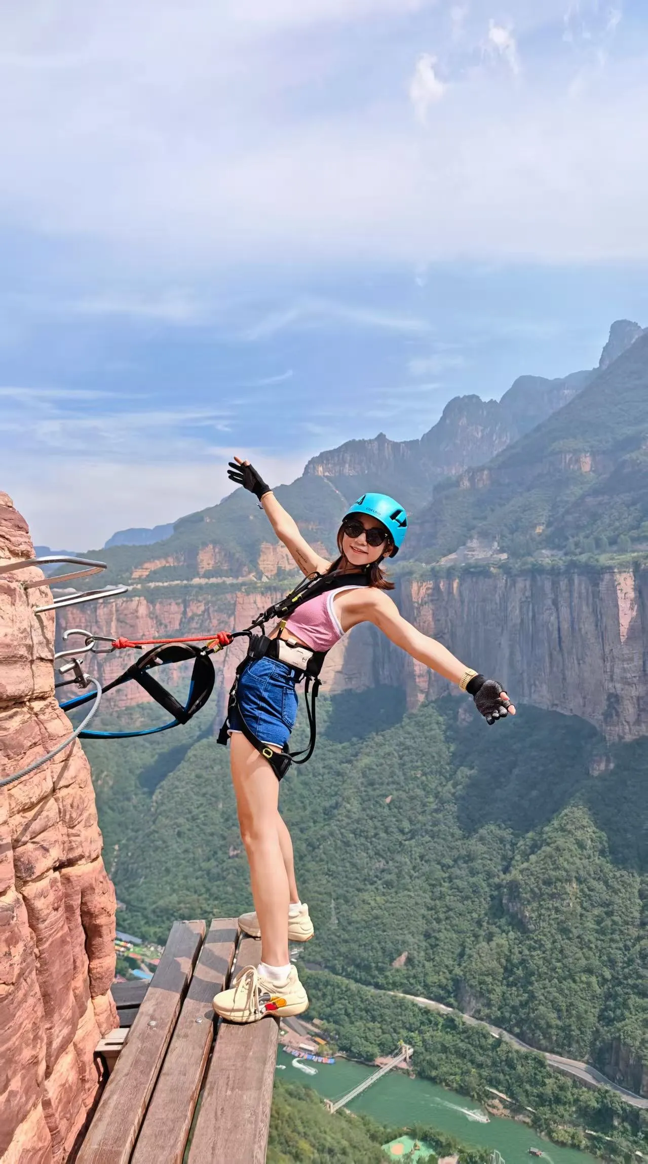Cliff edge via ferrata pose · Moments from Recent Visitors